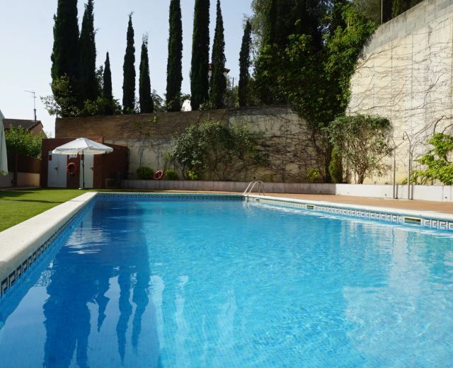 Casa adosada con jardín y piscina comunitaria en Cabrils en Cabrils (Ref. 02245)